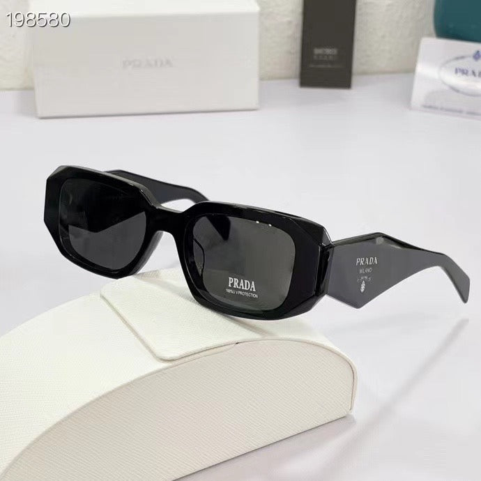 Lunettes Pr*da